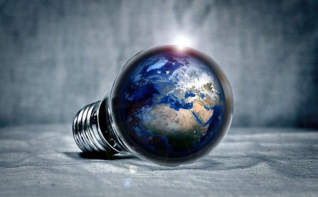 Globe in lightbulb to represent energy saving.