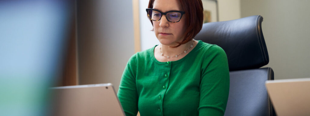 Woman using Microsoft cloud for financial services